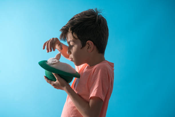 istock Portrait of a boy with rabbit 803972886