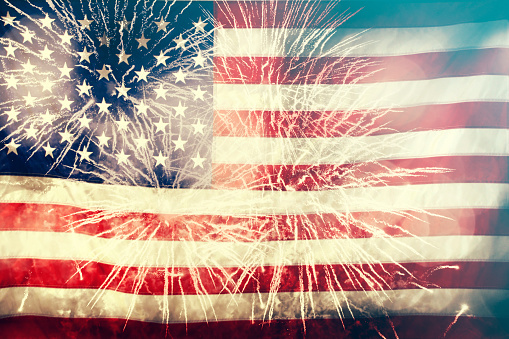 United States of America USA flag with fireworks background for 4th of July