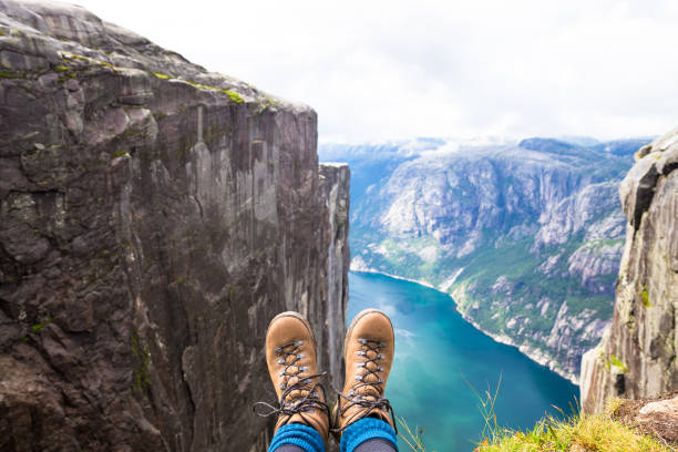 istock Happy people relax in cliff during trip Norway. hiking route 803987984
