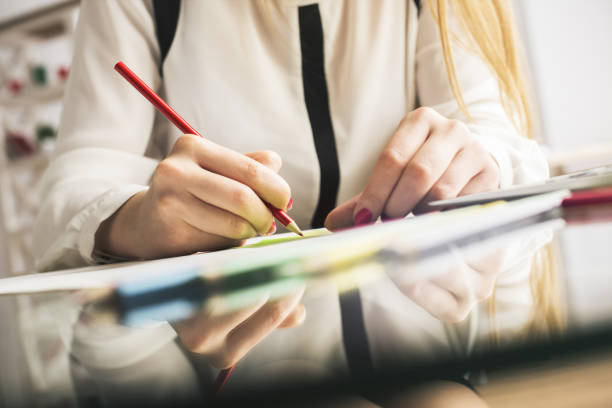 istock Female doodling with colorful pencils 804030052