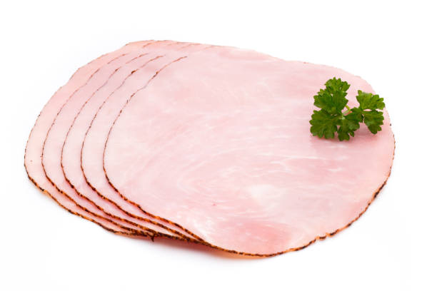 istock Thin slices of ham on white background. 804040482