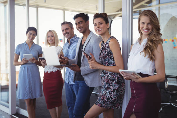 istock Portrait of creative business team using technologies at office 804057142