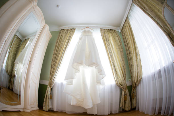 istock The perfect wedding dress on a hanger 804064786