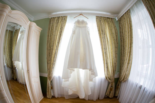istock The perfect wedding dress on a hanger 804067998