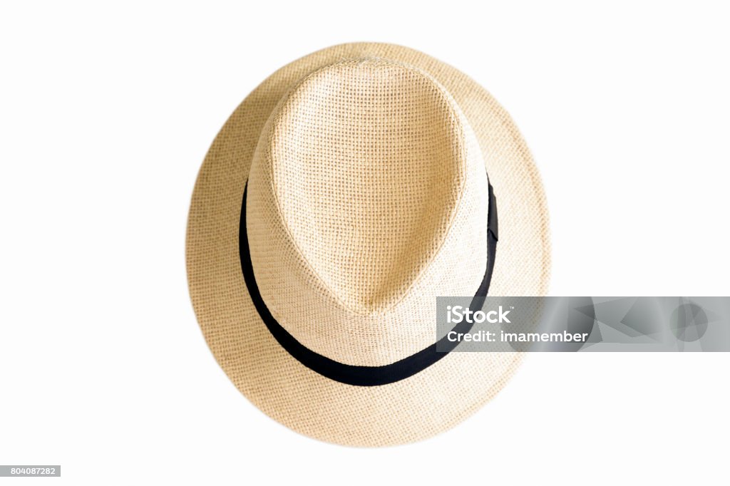 Summer hat, straw hat isolatd on white background, copy space Summer hat, straw woman’s hat with black ribbon isolated on white background with copy space, full frame horizontal composition High Angle View Stock Photo