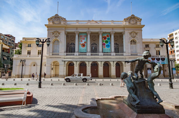 The Municipal Theater and a statue in downtown Santiago do Chile.