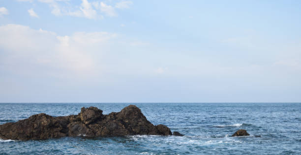 istock rocky area at sea 804137074