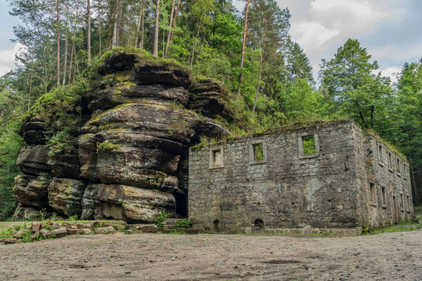 Dolsky mill in national park with old ruin of mill in north Bohemia