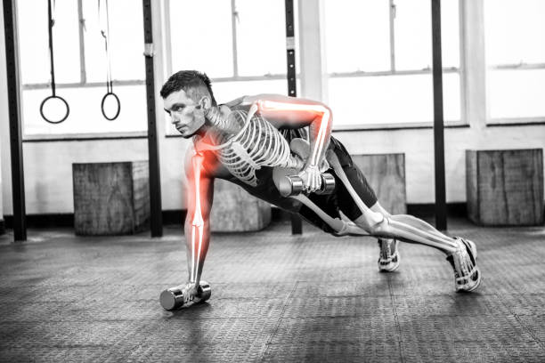 istock Highlighted body of strong man lifting weights at gym 804137574