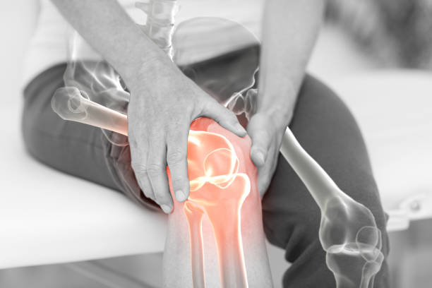 istock Mid section of man man holding sore knee 804154092