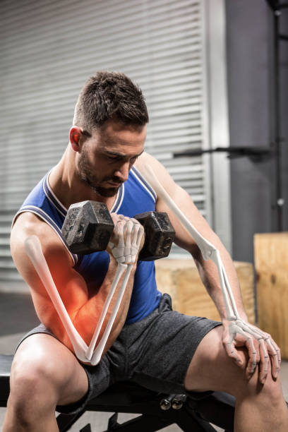 istock Male athlete doing excercise with dumbbells 804154268