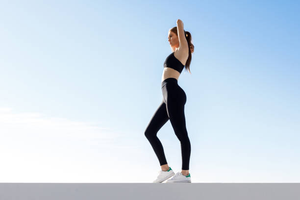 istock Fitness Woman performing stretches 804162922