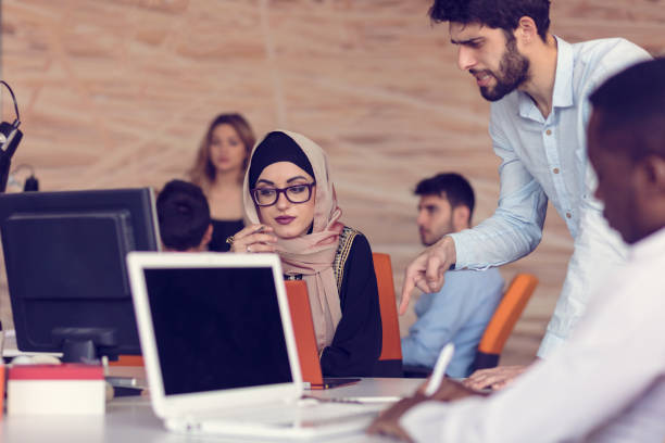 istock Multiracial contemporary business people working 804163308
