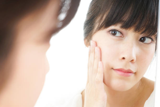 istock Young woman doing skin care 804177690