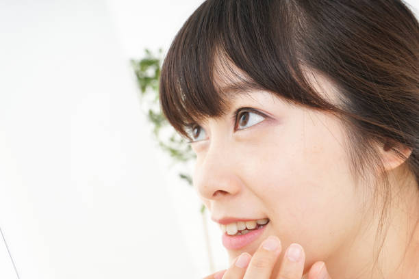 istock Young woman doing skin care 804177868