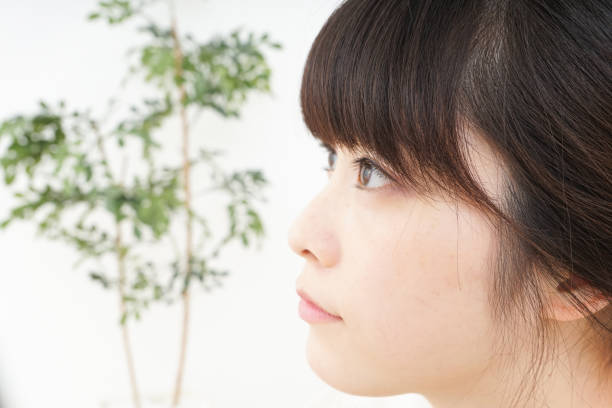 istock Young woman doing skin care 804177884
