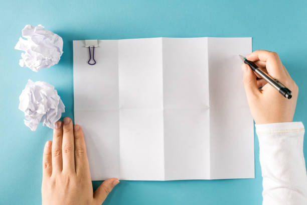 istock Blank paper with crumpled paper balls 804188888