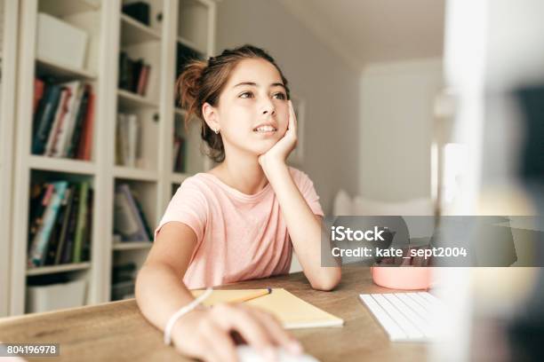 Working On A School Project Stock Photo - Download Image Now - Computer, Teenage Girls, Child