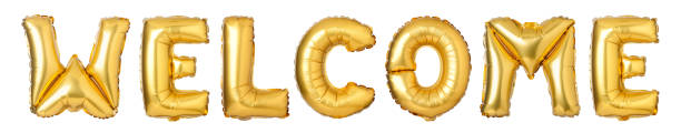 istock Upper case letters WELCOME from golden balloons 804218272