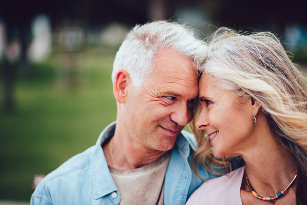istock Senior couple in love tenderly looking at each other 804223580