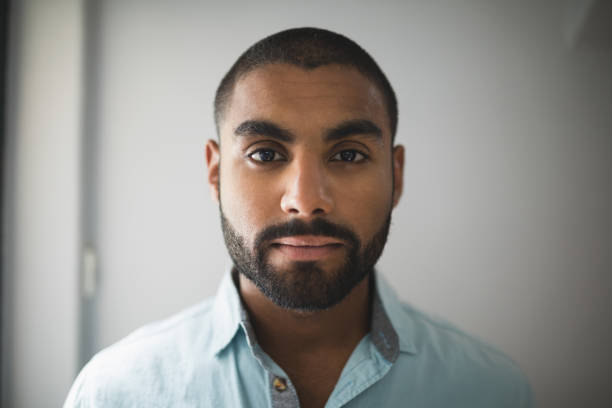 istock Portrait of serious young man 804223604