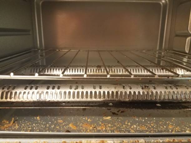 istock inside a toaster oven with bread crumbs 804226168
