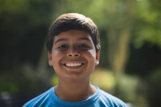 istock Portrait of smiling boy 804234534