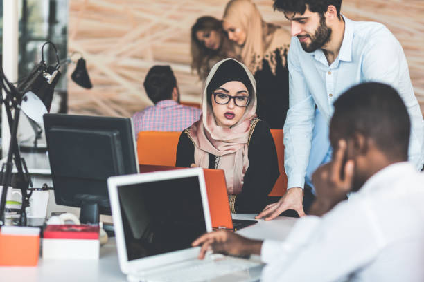 istock Multiracial contemporary business people working 804234878