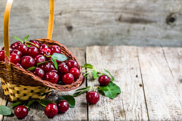 istock Organic cherries, farm fresh fruits on farmer table 804253450