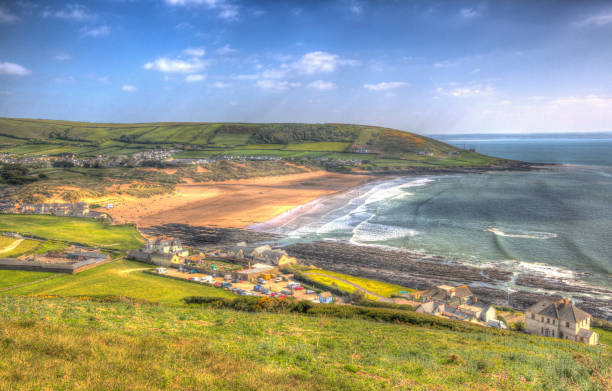 Croyde beach Devon England UK in colourful hdr Croyde beach Devon England UK in colourful hdr in summer croyde photos stock pictures, royalty-free photos & images