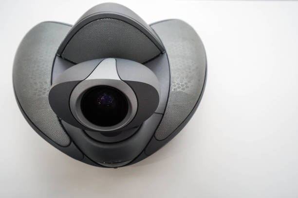 istock top view of conference phone with camera on table in office boardroom 804284140