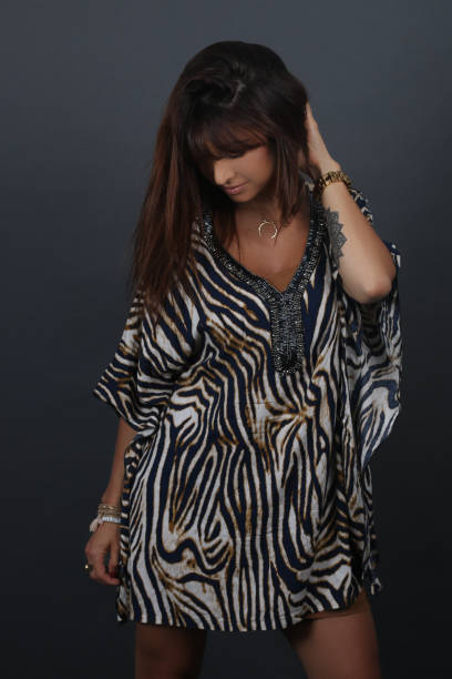istock Beautiful boho woman wearing poncho 804292498