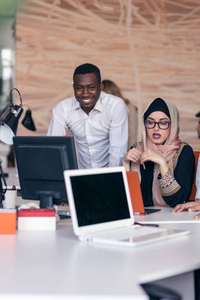 istock Multiracial contemporary business people working 804295574