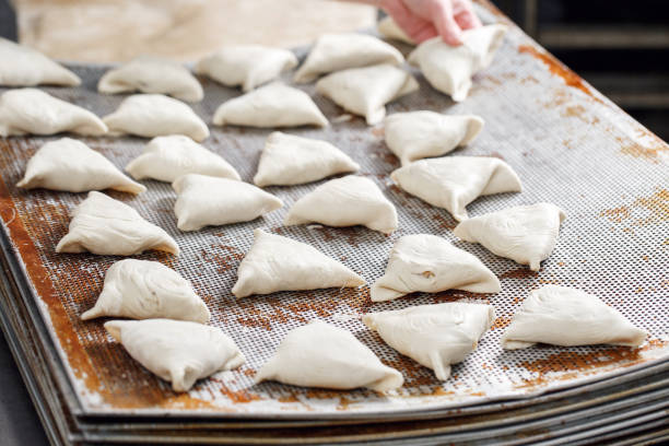 istock billet bun of dough with filling inside. Prepared for baking in baking production. 804309478