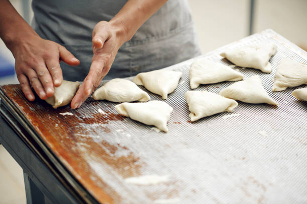 istock billet bun of dough with filling inside. Prepared for baking in baking production. 804309876
