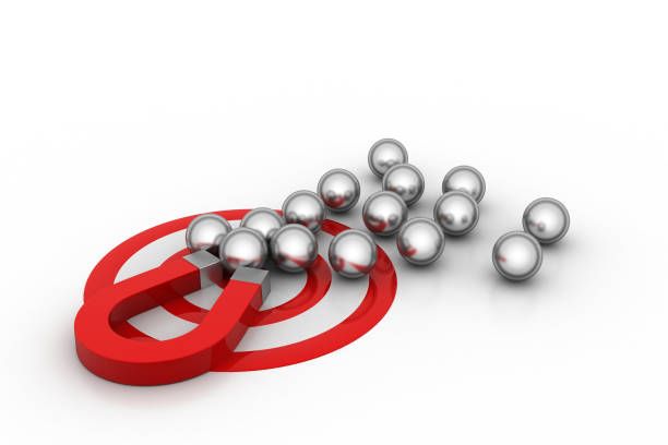 istock Magnet attracted the steel balls, concept of competition 804313794