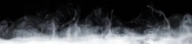 Photo of Abstract smoke move on black background