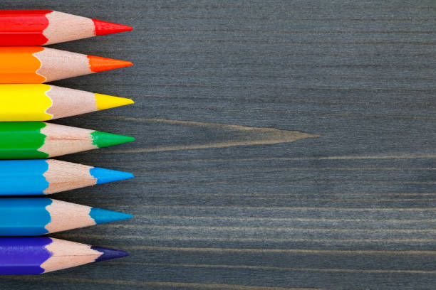 istock Top view on colored pencils on a blackboard. Macro shot. 804332760