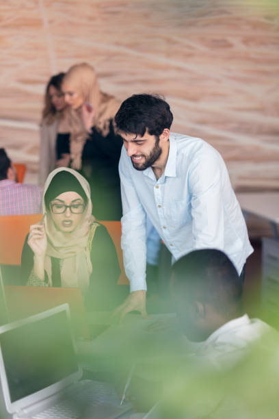 istock Multiracial contemporary business people working 804335800