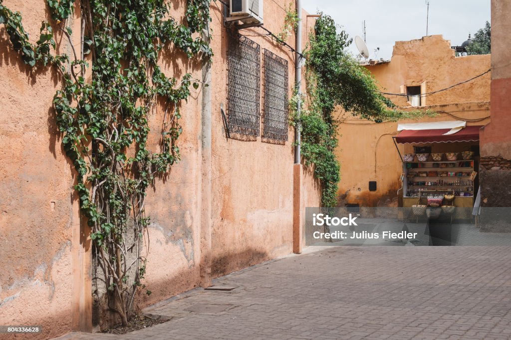 Backstreet in the Medina A calm backstreet with an abandoned market stall in Marrakech Abandoned Stock Photo