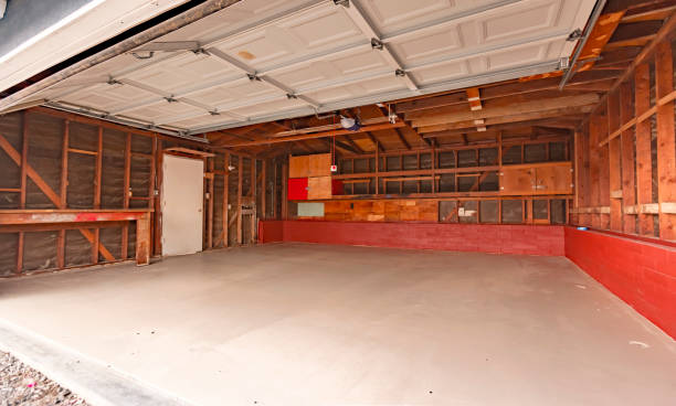 istock Garage doors open with a garage with wood support exposed 804339978