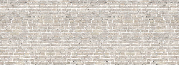 istock White wash old brick wall panorama. 804348818