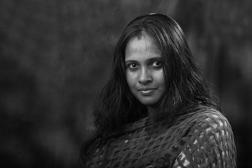 Black and white portrait of a woman of Indian subcontinent
