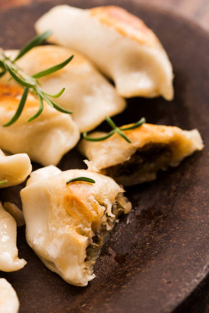 istock Polish pierogi filled with cabbage and mushrooms 804354082