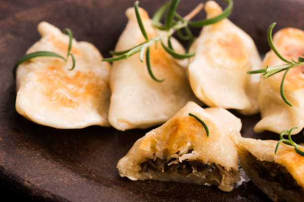 istock Polish pierogi filled with cabbage and mushrooms 804354096