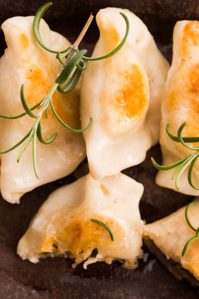 istock Polish pierogi filled with cabbage and mushrooms 804354168