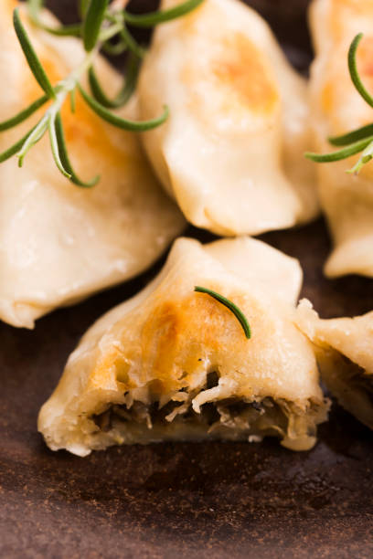 istock Polish pierogi filled with cabbage and mushrooms 804354180