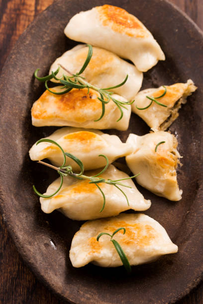 istock Polish pierogi filled with cabbage and mushrooms 804354230