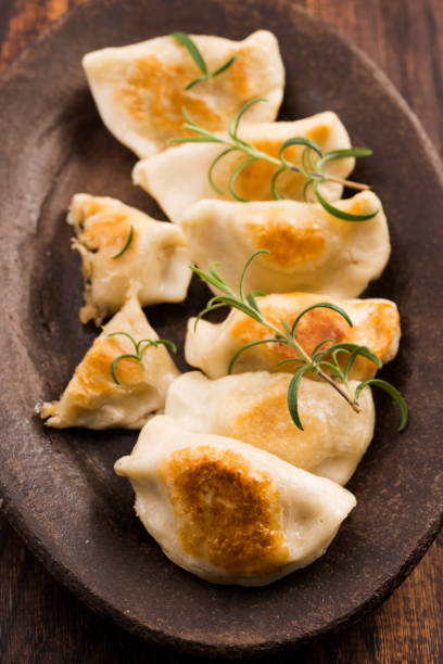 istock Polish pierogi filled with cabbage and mushrooms 804354262