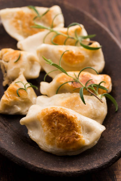 istock Polish pierogi filled with cabbage and mushrooms 804354266